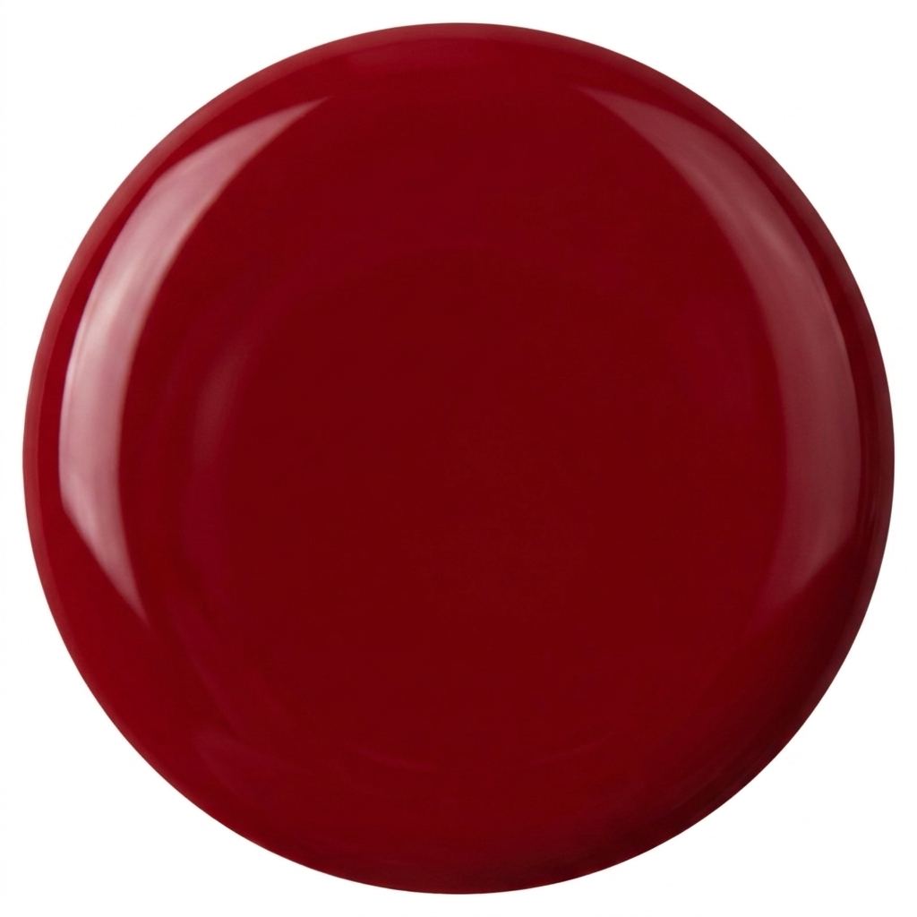 Drop swatch of MineVital Sweet Dream — glossy rich cherry red water-based breathable nail polish color