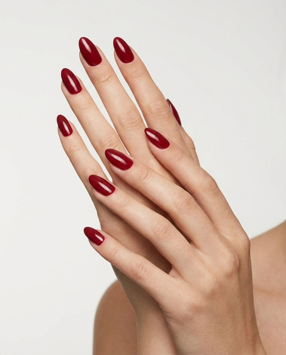 Hands with MineVital Sweet Dream manicure — rich cherry red water-based breathable nail polish on natural nails